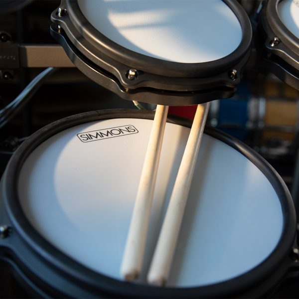 close up of Titan 50 electronic snare with drumsticks