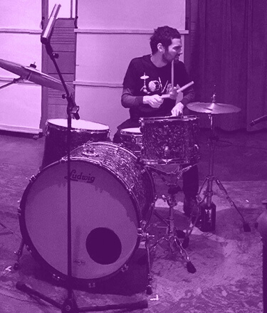 drummer playing acoustic drum