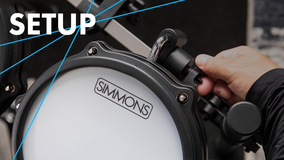 Simmons Titan 50 electronic drum kit mount clamp close up with graphics on top left corner that says 