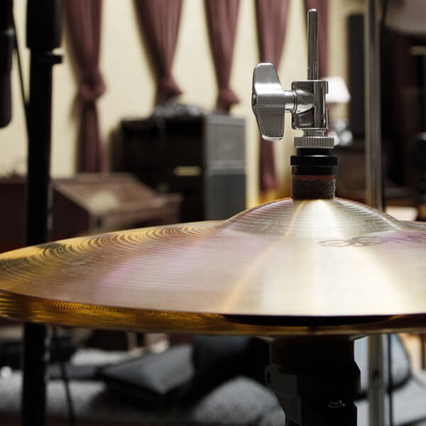 close up of acoustic hi-hat cymbal
