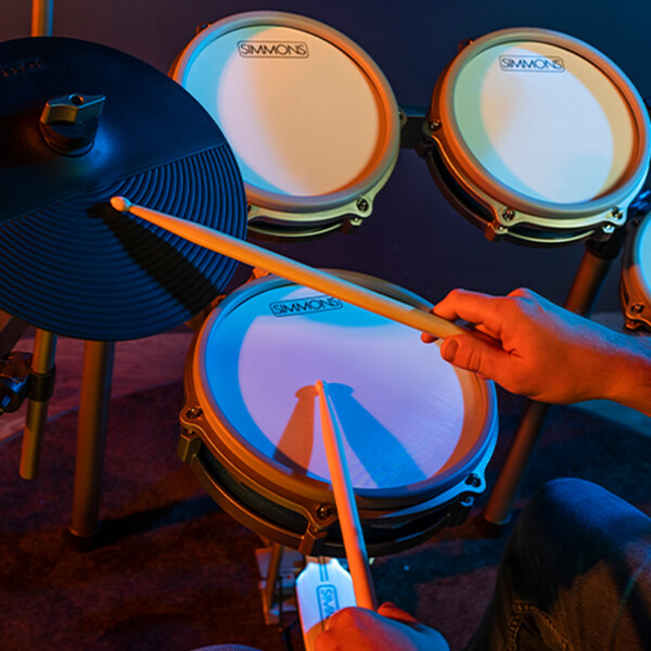 close up of drummer playing the snare and hats on a simmons titan 70 electronic drum kit