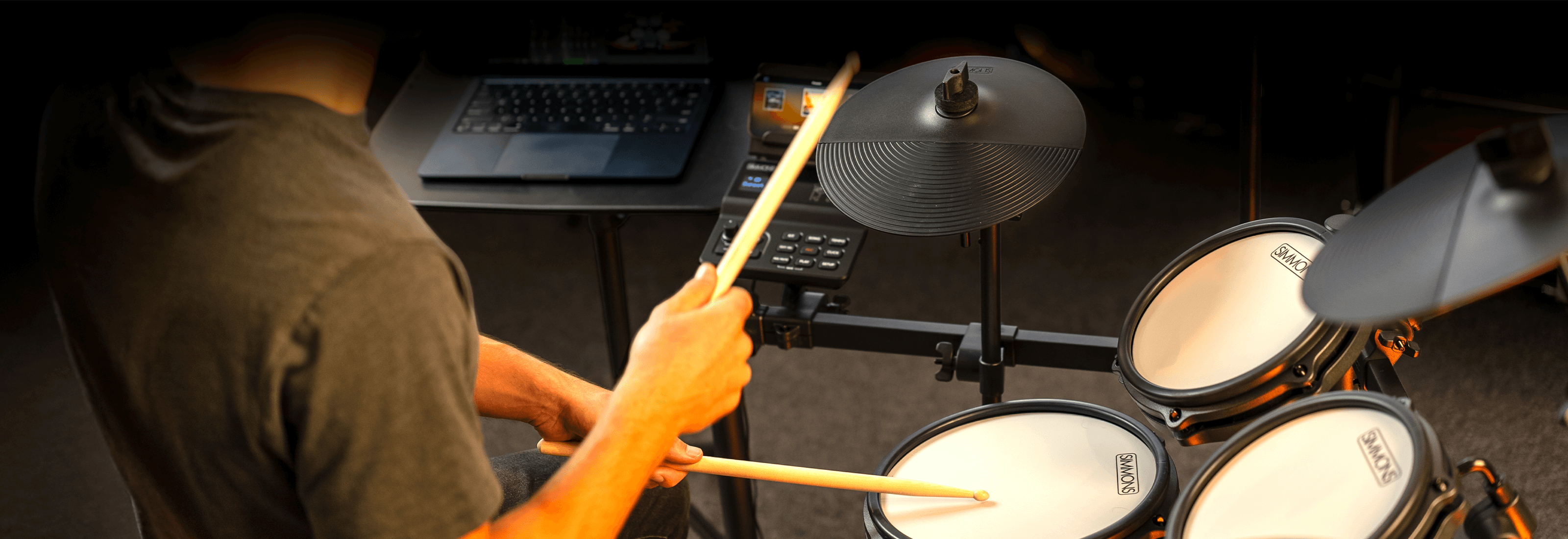 person playing the simmons titan 50 B-EX electronic drum kit